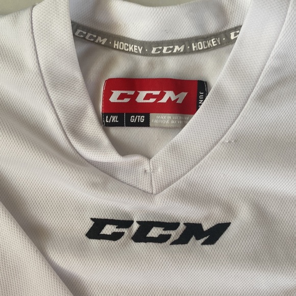 CCM hockey jersey size L. It has a mark in the back. See photos. - Picture 2 of 3